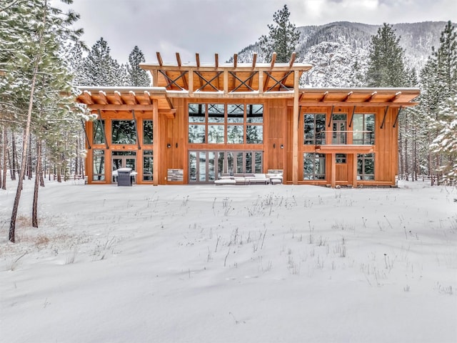 1180 Reardon Ln, Alberton, MT 59820 - snow covered back of property with a mountain view