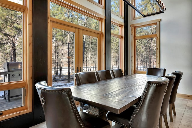 1180 Reardon Ln, Alberton, MT 59820 - dining area featuring light tile patterned floors and baseboards