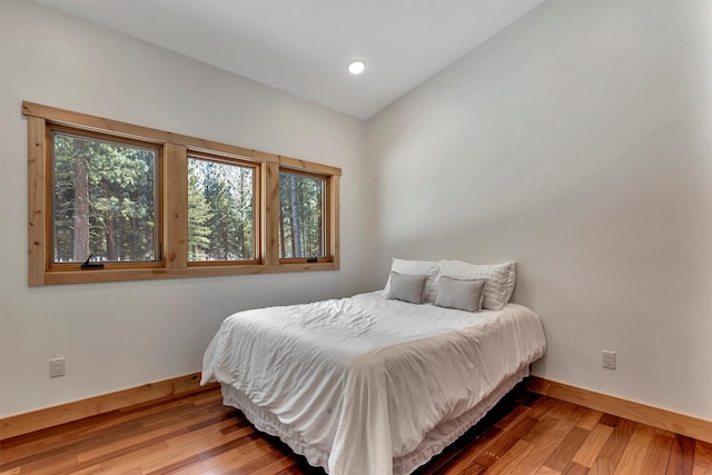 bedroom featuring hardwood / wood-style flooring