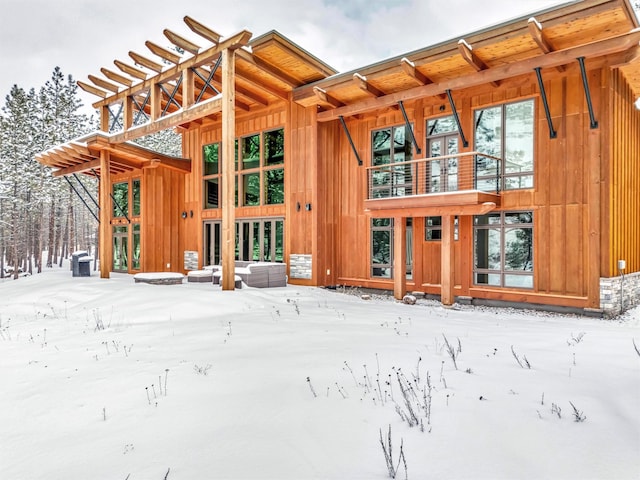 view of snow covered house