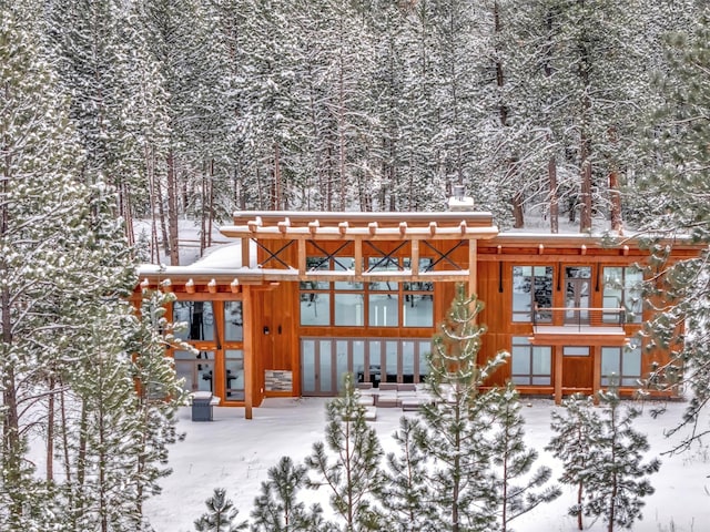 view of snow covered property