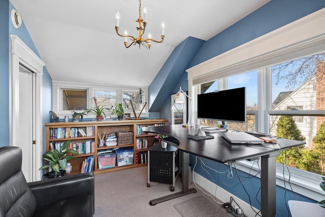 carpeted home office featuring a chandelier, vaulted ceiling, and a wealth of natural light