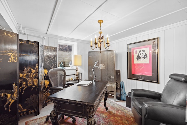 office space with carpet flooring and a notable chandelier