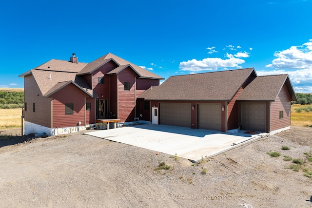 view of front of property featuring a garage