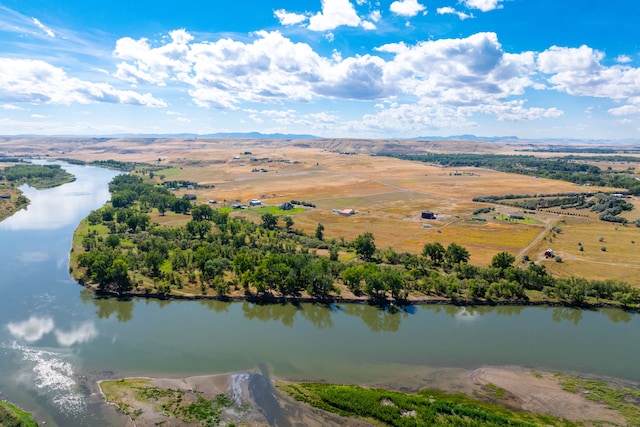 bird's eye view featuring a water view and a rural view