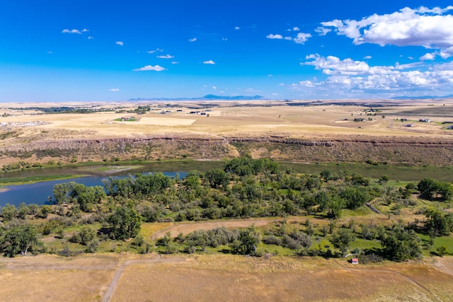 bird's eye view with a water view and a rural view