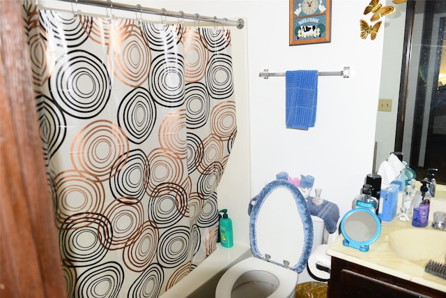 full bathroom featuring shower / bath combination with curtain, vanity, and toilet