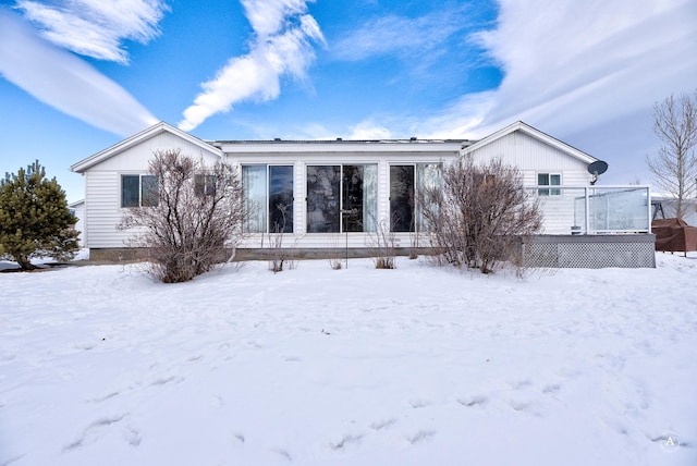 view of snow covered property