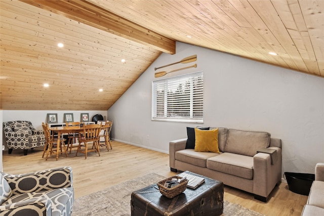 living area with vaulted ceiling with beams, wood finished floors, wood ceiling, and baseboards