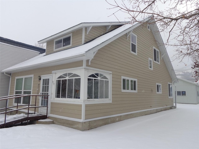 view of snow covered property