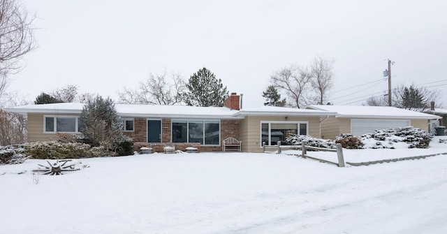 ranch-style home with a garage