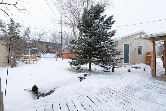 view of yard covered in snow