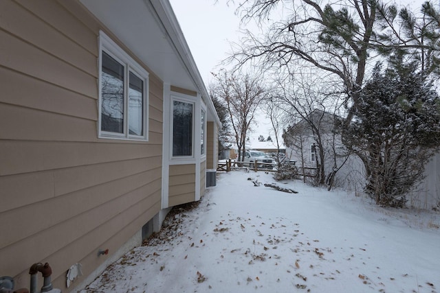 view of yard layered in snow