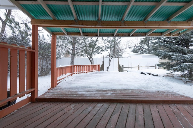 view of snow covered deck