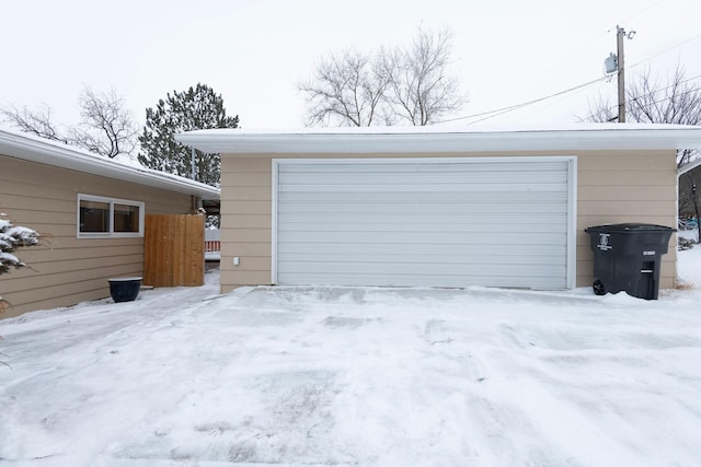 view of snow covered garage