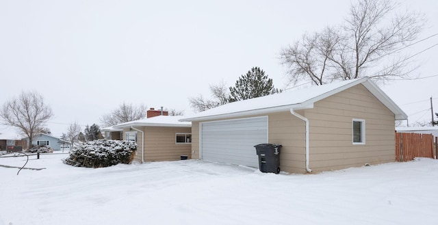 exterior space featuring a garage