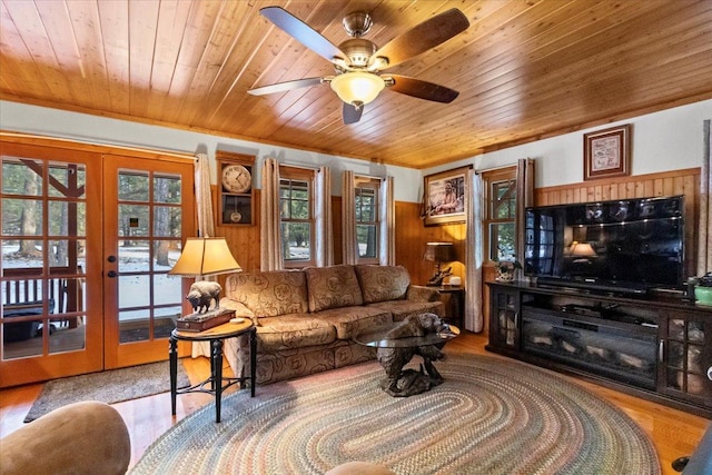 192 Crystal Lakes Dr, Eureka, MT 59917 - living area with healthy amount of natural light, wood ceiling, french doors, ceiling fan, and wood finished floors
