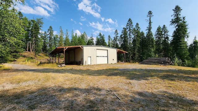 view of outdoor structure with a garage