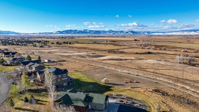 aerial view with a mountain view and a rural view