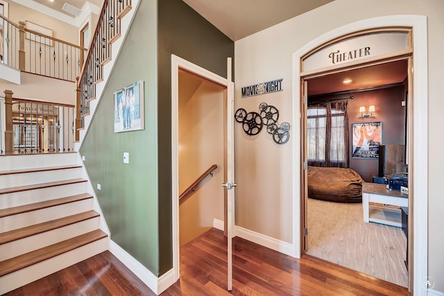 4428 Fox View Loop, Helena, MT 59602 - stairway with wood finished floors and crown molding