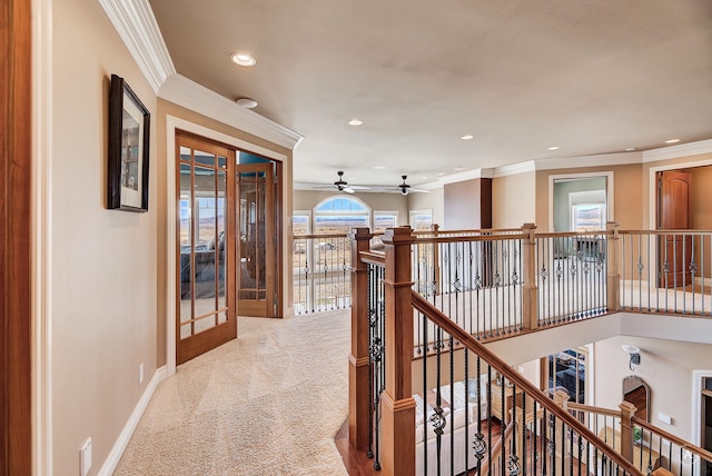4428 Fox View Loop, Helena, MT 59602 - corridor featuring an upstairs landing, carpet flooring, recessed lighting, plenty of natural light, and crown molding