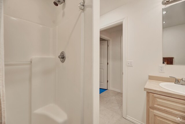 4428 Fox View Loop, Helena, MT 59602 - full bath with vanity, a shower, and tile patterned floors