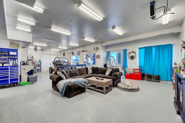 living room with concrete flooring