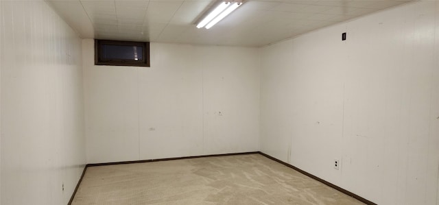 basement with light colored carpet