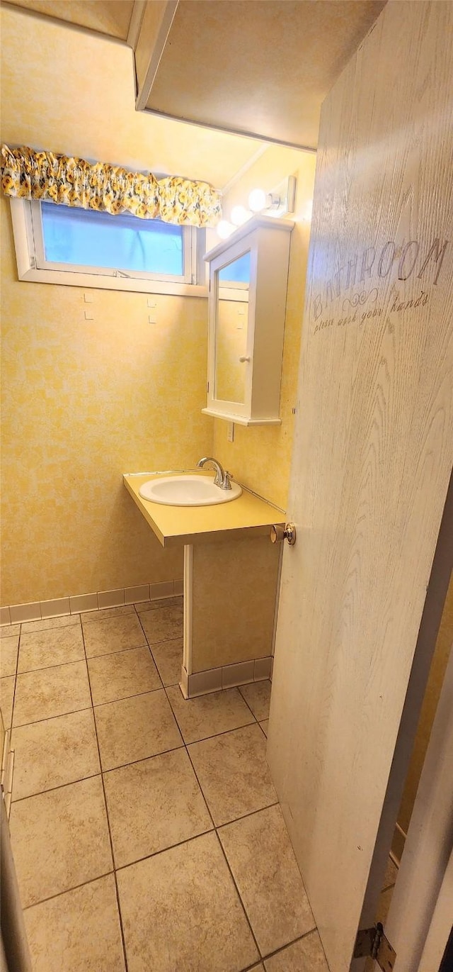 bathroom featuring sink and tile patterned floors