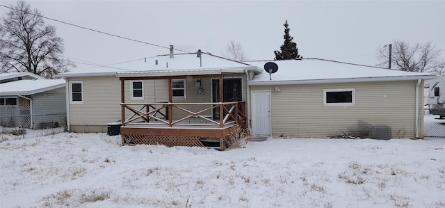 view of snow covered house