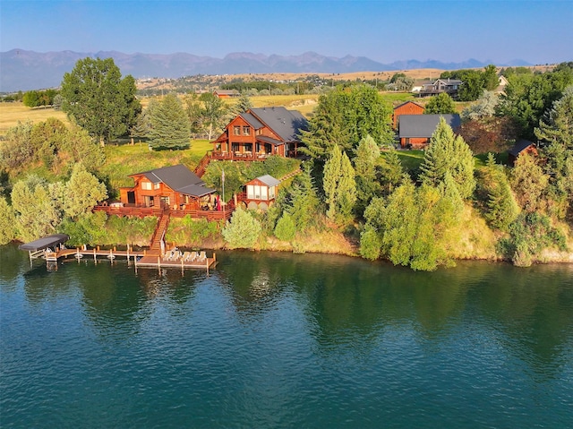 aerial view with a water and mountain view