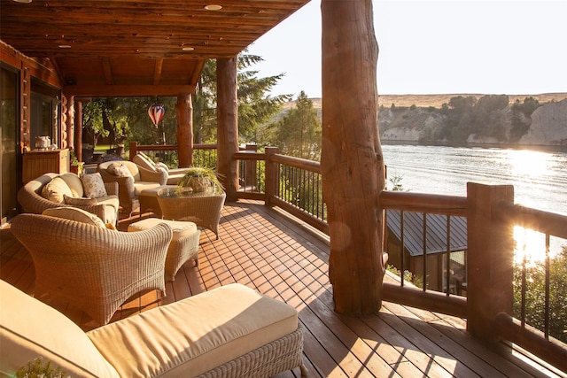 wooden terrace with a water view