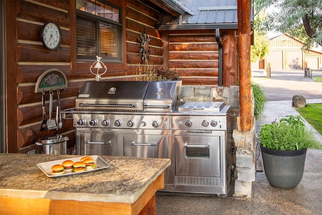 view of patio / terrace featuring an outdoor kitchen