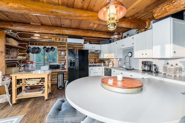 kitchen featuring sink, wood ceiling, black appliances, log walls, and white cabinets