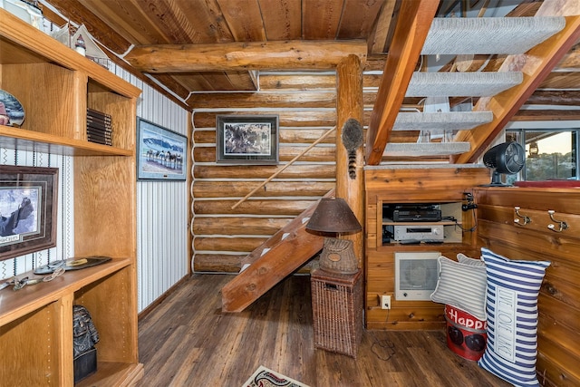 interior space featuring beam ceiling, wood ceiling, dark hardwood / wood-style floors, and log walls