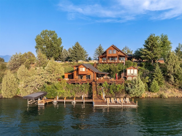 dock area with a deck with water view