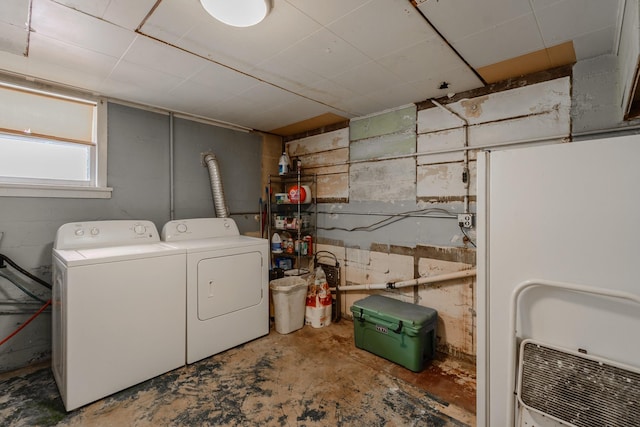 laundry room with washer and dryer