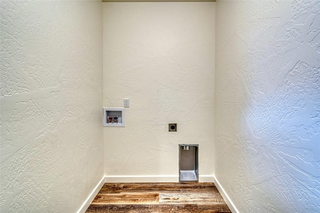 laundry room featuring electric dryer hookup, washer hookup, and hardwood / wood-style flooring