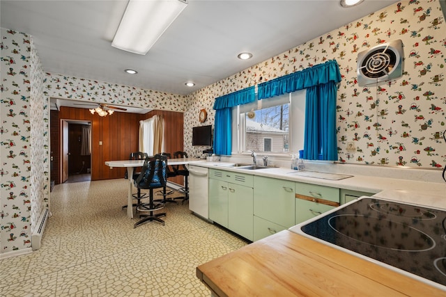 119 Fair St, Deer Lodge, MT 59722 - kitchen featuring wallpapered walls, dishwasher, green cabinetry, a sink, and recessed lighting