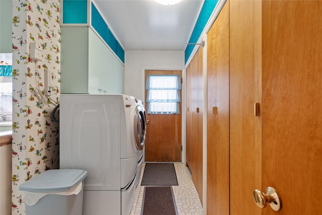 laundry room with washer and clothes dryer