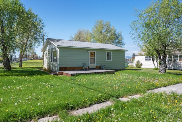 119 Fair St, Deer Lodge, MT 59722 - back of house featuring a yard