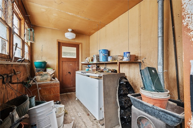 interior space featuring hardwood / wood-style flooring and wood ceiling