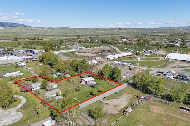 119 Fair St, Deer Lodge, MT 59722 - aerial overview of property's location featuring property parcel outlined and mountains