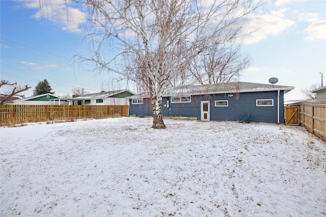 view of snow covered property