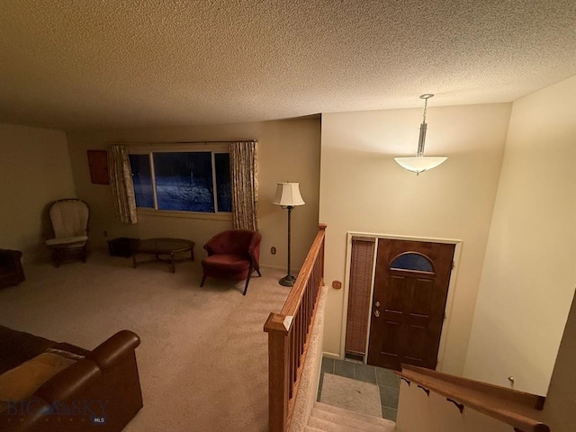 3435 Parkway St, Butte, MT 59701 - carpeted foyer entrance with a textured ceiling