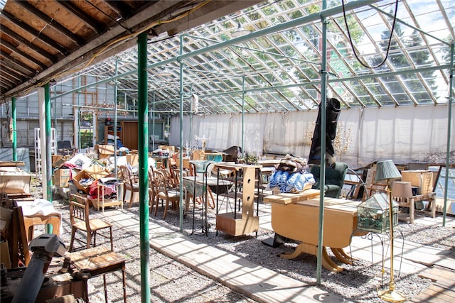 view of patio featuring an outbuilding