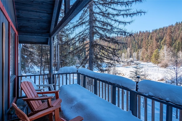 view of snow covered deck