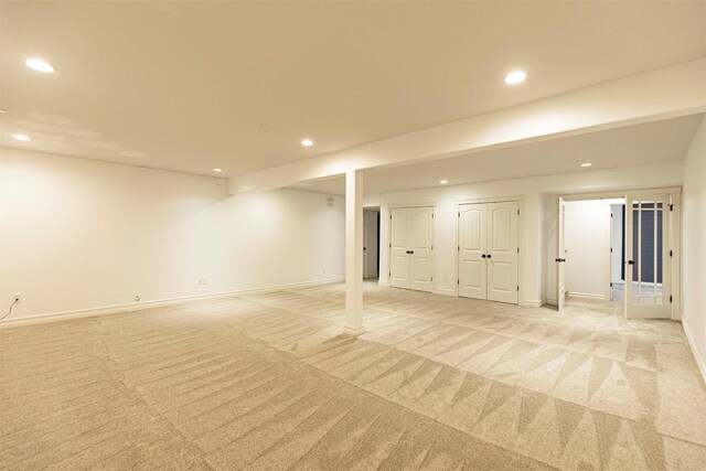 basement with light colored carpet