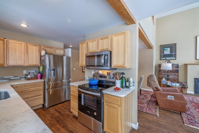 kitchen featuring recessed lighting, appliances with stainless steel finishes, light brown cabinets, and dark wood-style flooring