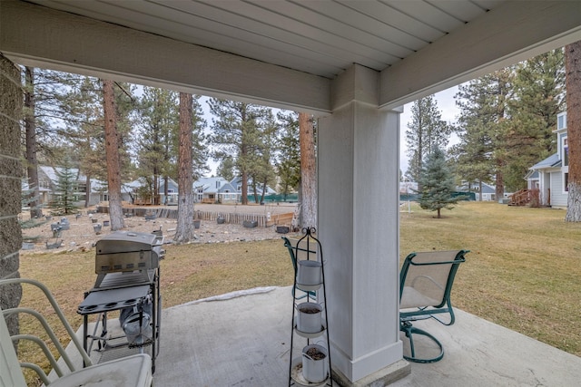 view of patio / terrace featuring fence
